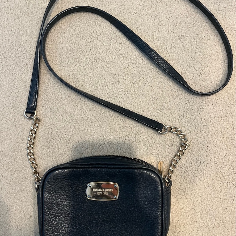 Michael Kors Black and Gold Crossbody Bag with Structured Design